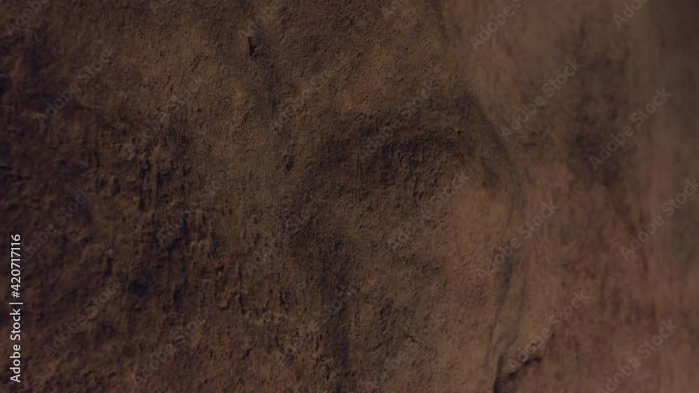 Grunge stone wall texture. Low light Grunge stone wall texture. Low light