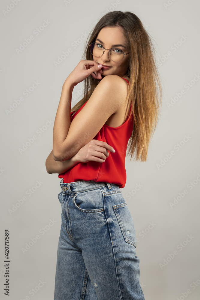pretty young sweet girl isolated with long hair and casual dress looking in camera pretty young sweet girl isolated with long hair and casual dress looking in camera
