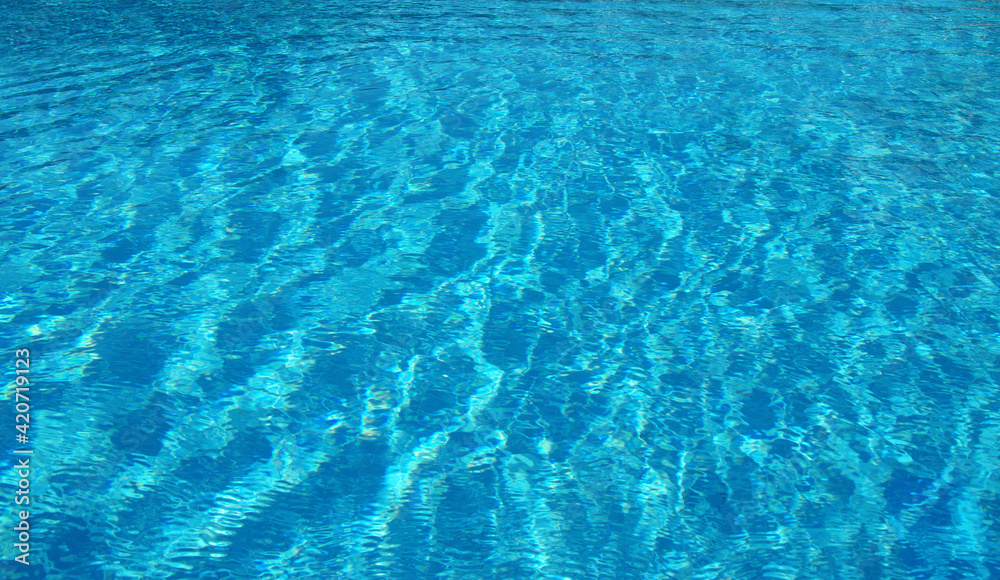 Surface of blue pool.
