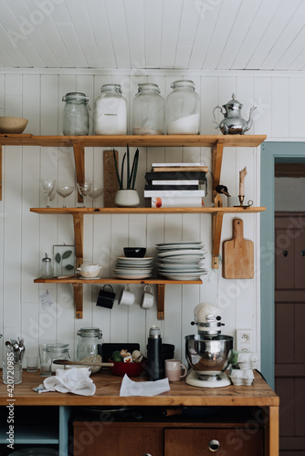 small cozy and artistic kitchen with wood details photo