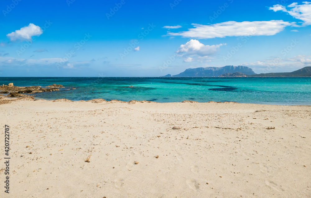 Panoramic view of Pittulongu beach, in the background the island of Tavolara, Olbia - Sardinia