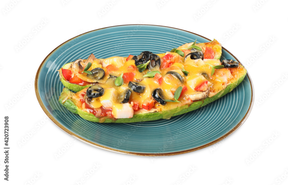 Plate of baked stuffed zucchinis on white background