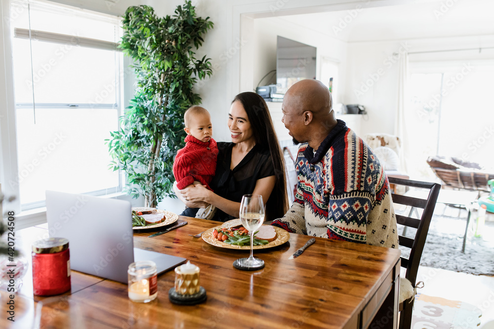 Beautiful Family Having a Holiday Meal During the Pandemic