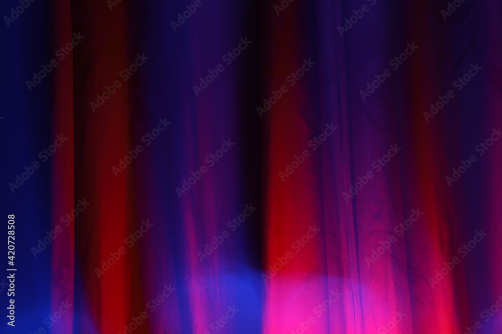 Dark blue and red abstract colorful lights background with space to write your text