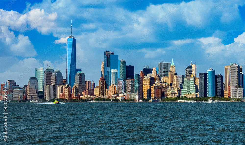 View of Manhattan Skyline, from Liberty State Park in Jersey City, New Jersey. Manhattan is the most densely populated of the five boroughs of New York City.