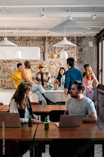 Colleagues Having Snack in Coworking