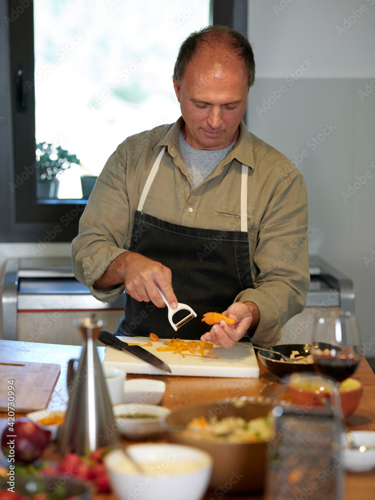 Cook preparing dinner. Cook preparing dinner.