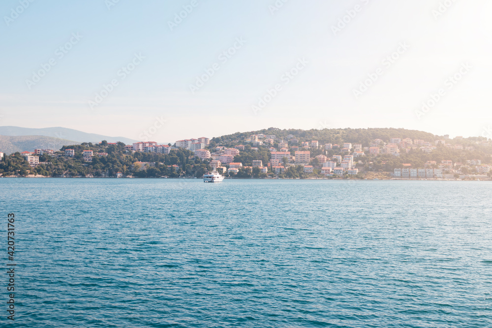 Beautiful View at town Okrug Gornji from boat in the Adrian sea at sunny summer morning