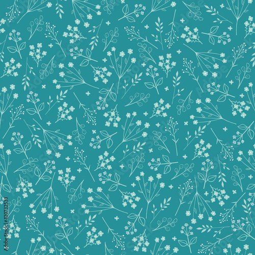Seamless pattern of spring flowers. Vector illustration. Blue outline on turquoise background