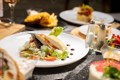 details of tasty brunch with chicken, tomato and desert