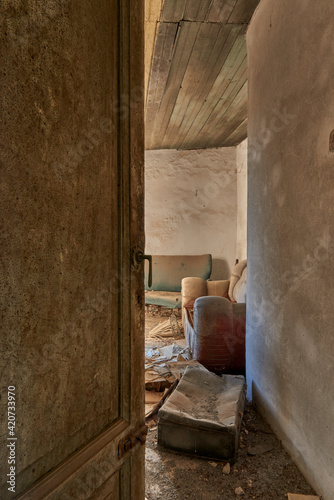 interior of a peasant house that has been disused for years and decadent