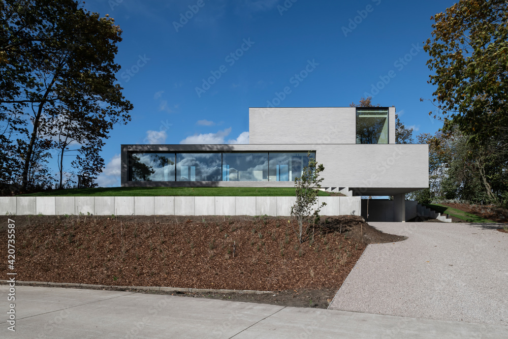 © Koen Van Damme/Stocksy - Facade of villa © Koen Van Damme/Stocksy - Facade of villa