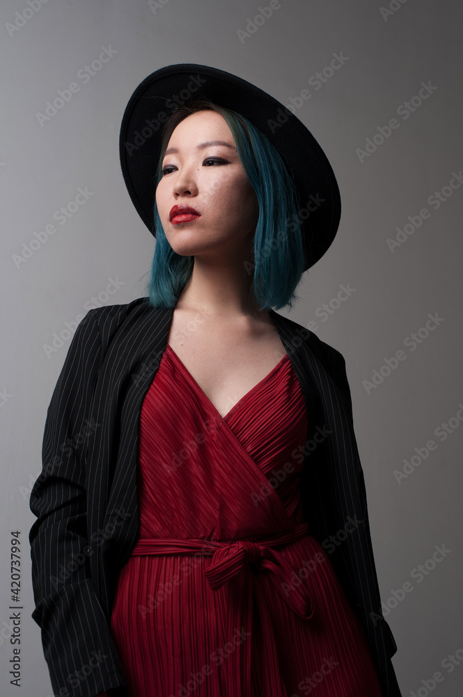 Studio portrait of asian woman