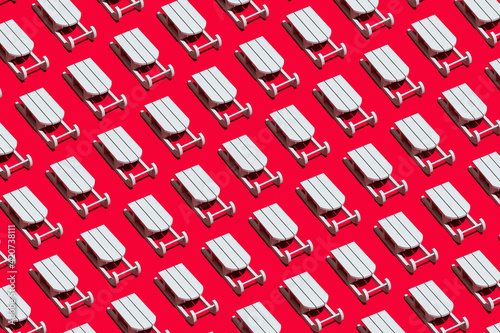 White sleigh on red background