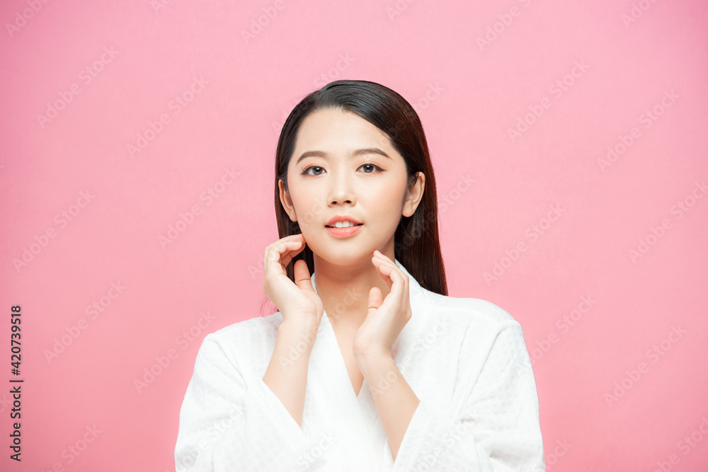 Beautiful woman with perfect makeup on pink background. Beauty and skin care concept Beautiful woman with perfect makeup on pink background. Beauty and skin care concept