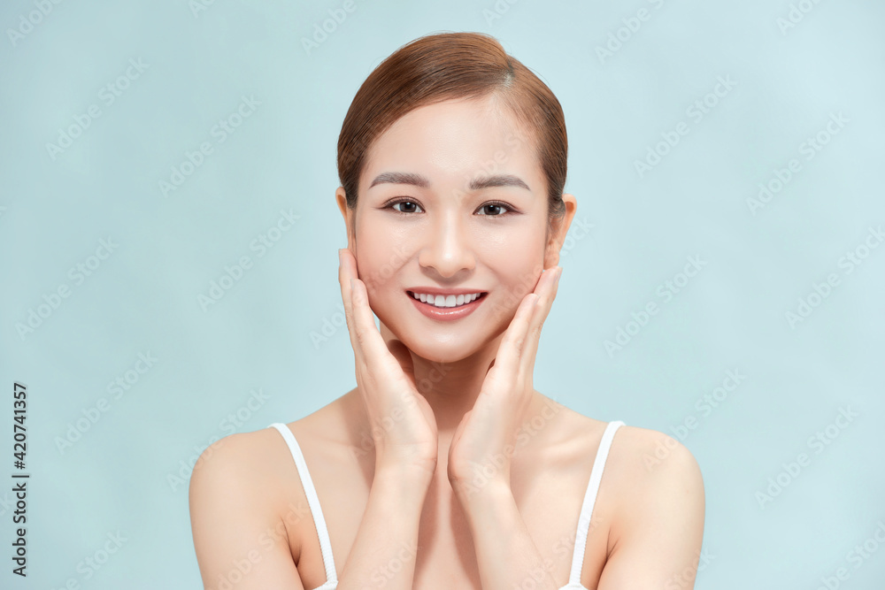 Beautiful Asian woman touching soft cheek smile with clean and fresh skin Happiness and cheerful with positive emotional,isolated on white background, Beautiful Asian woman touching soft cheek smile with clean and fresh skin Happiness and cheerful with positive emotional,isolated on white background,