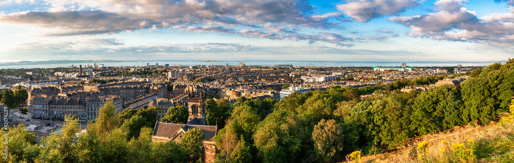 Panoramic view of Edinburgh, Scotland, UK, as viewed from the Arthurs Seat hill at the sunset