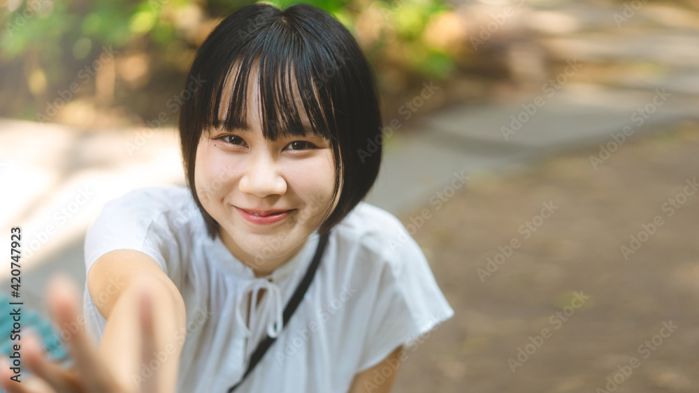 Portrait of happy smile asian woman with short hair and looking camera.