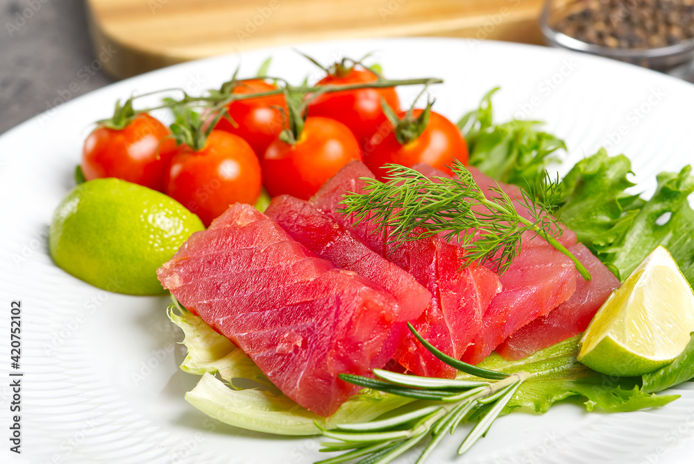 tuna sushi, Tuna carpaccio, tuna sashimi with vegetables. healthy eating with seafood, we cook at home