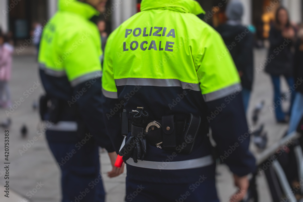 Italian police squad patrol formation back view with Italian police squad patrol formation back view with