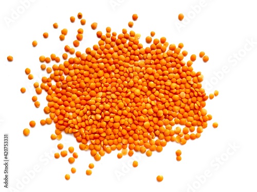 Red lentils isolated on white background.  A source of protein in vegetarian diets.