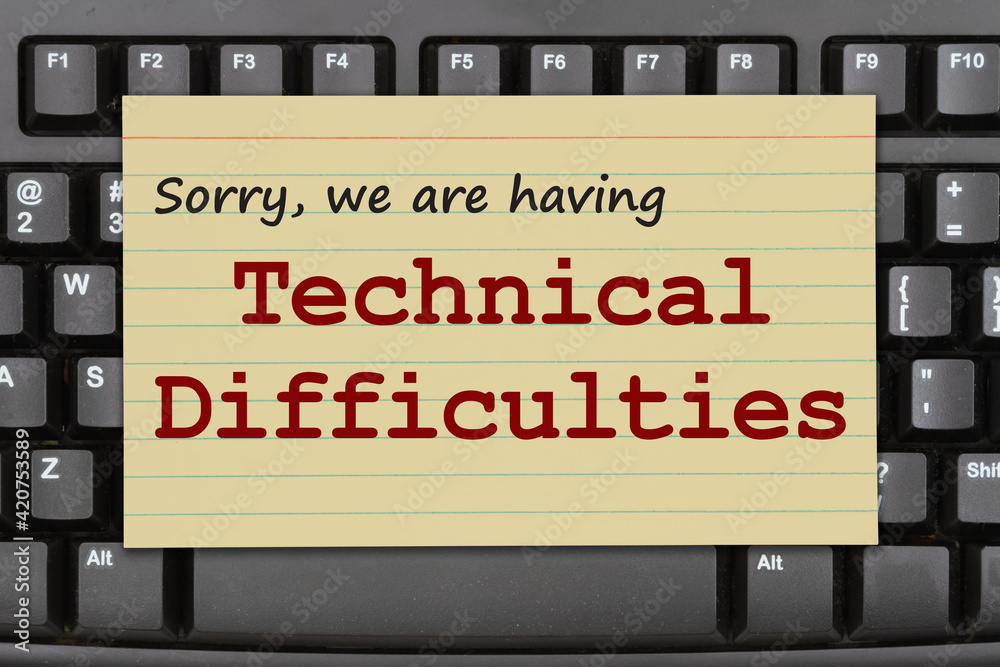 Technical Difficulties message on a black keyboard