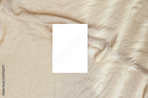 White blank paper on beige background