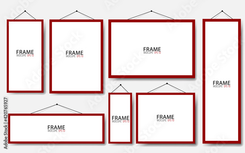 Realistic hanging on a wall blank red picture frames collection. Modern poster mockup. Empty photo frame. Vector illustration.