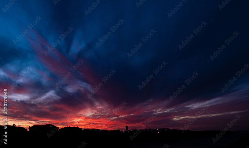 Colors in the sky after golden hour, a sunset over the city 