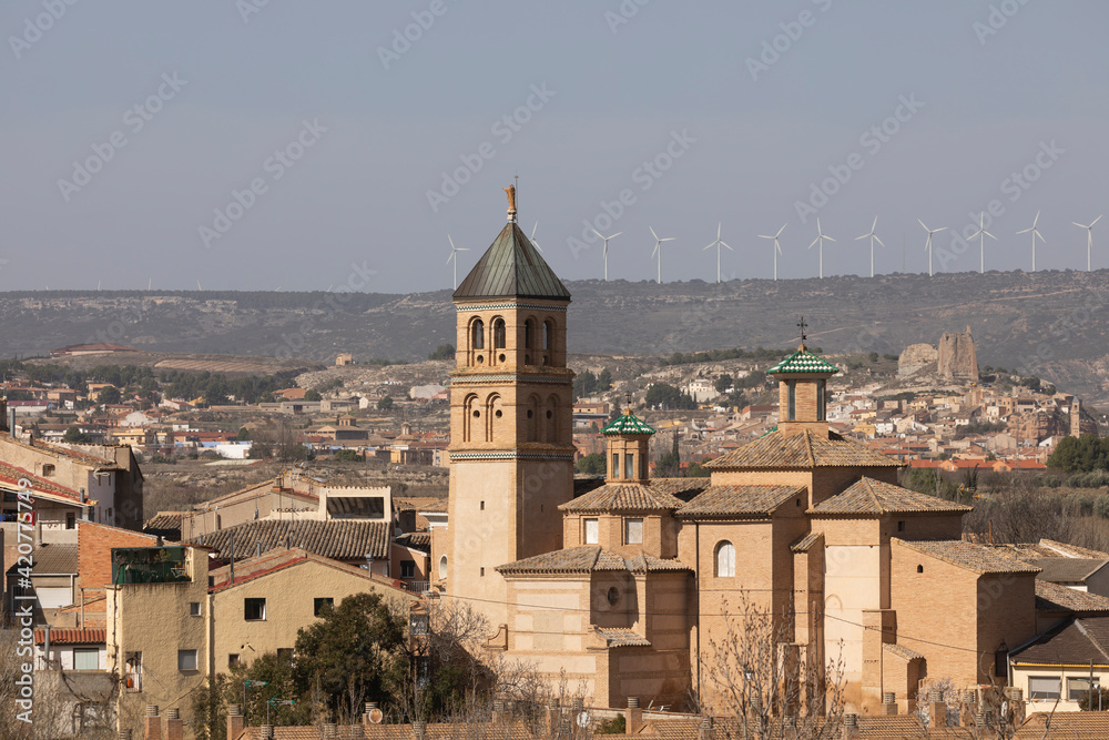 General view of the picturesque Ainzon skyline and surrounding rural landscape, with Our Lady of Mercy parish church, in the Campo de Borja region, Zaragoza, Aragon, Spain.