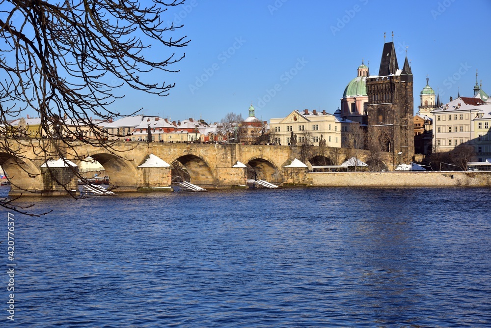 Prague during wintertime, Charles Bridge on the Vltava River, Prague, Czech Republic.