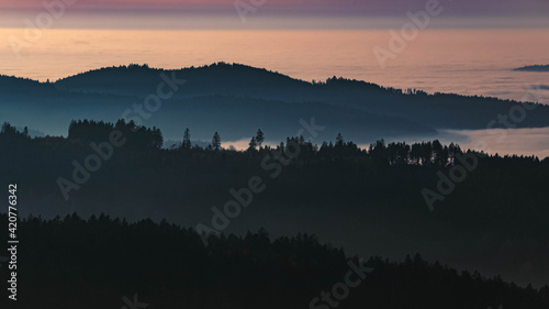 Beautiful sunset above the clouds near Kostenz, Bavarian forest, Bavaria, Germany © Martin Erdniss