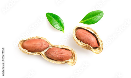 Unpeeled peanuts in nutshell isolated on white