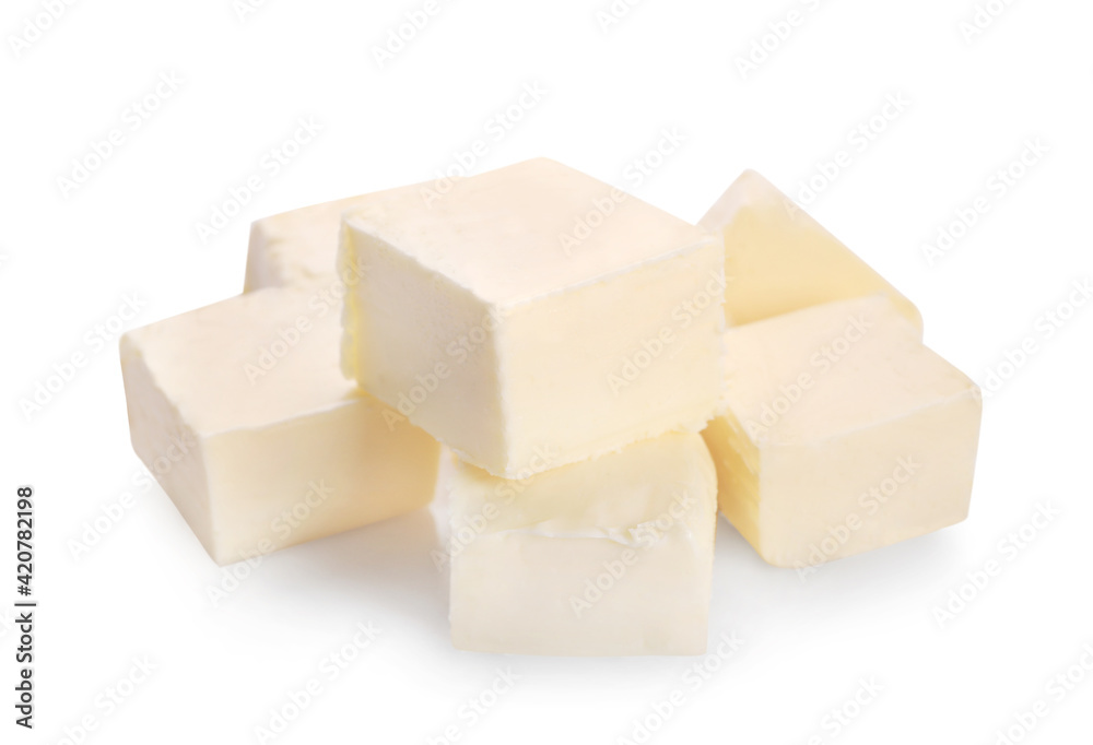 Pieces of fresh butter isolated on white background. Pieces of fresh butter isolated on white background.