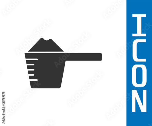 Grey Washing powder in a measuring cup icon isolated on white background. Vector