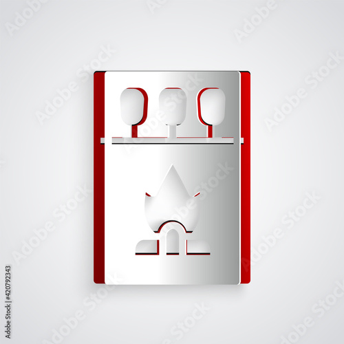 Paper cut Open matchbox and matches icon isolated on grey background. Paper art style. Vector