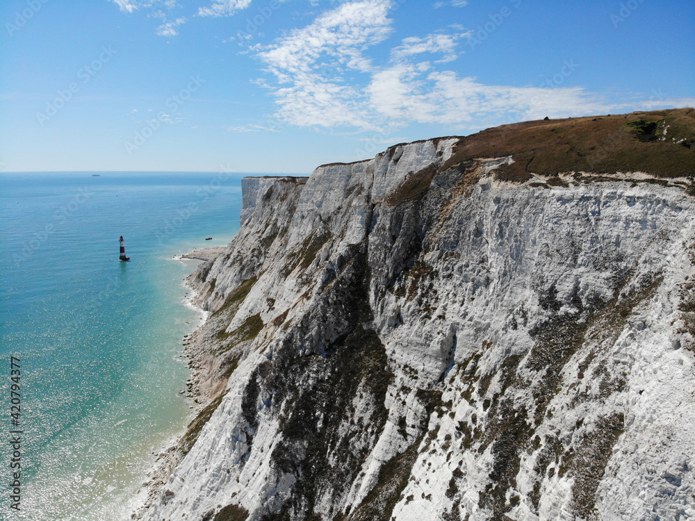 Aerial view to the white cliffs and Beachy Head in Eastbourne, East Sussex, England, United Kingdom