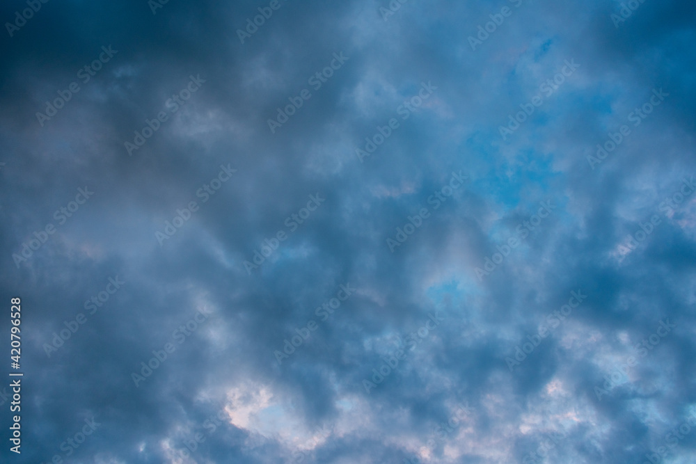 Fototapeta premium Stormy grey sky with fluffy clouds, abstract background