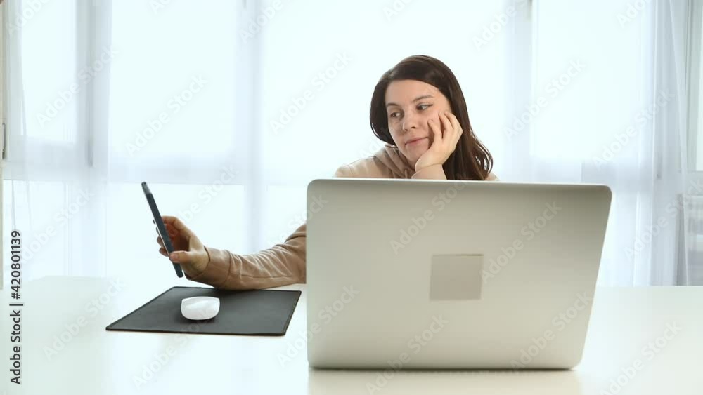woman freelancer coder burnout bored at the laptop woman freelancer coder burnout bored at the laptop