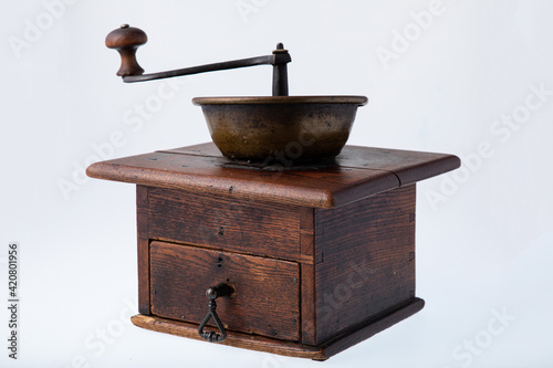Vintage manual hand coffee grinder for grinding coffee beans.