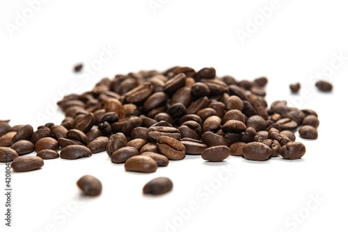 Cappuccino and coffee beans on a white background.