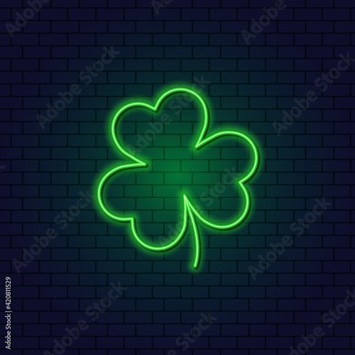 Neon Clover. Patrick's Day. A Leaf of Clover. Green icon of the Irish Shamrock for St. Patrick's Day. Neon design element for banner, website, letter, pub.
