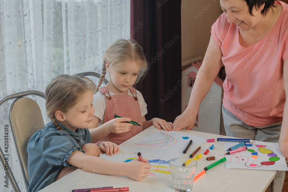 grandmother draws with granddaughters home grandmother draws with granddaughters home
