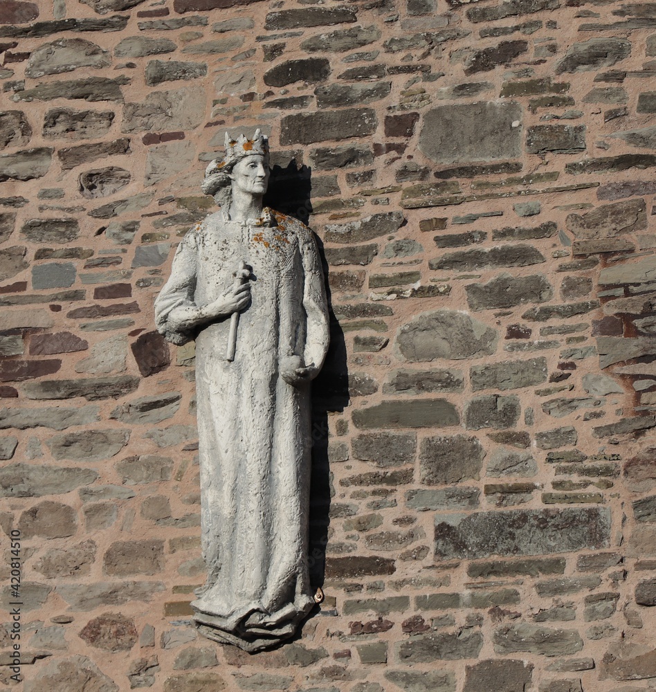 Sculpture of King Henry VII on a Wall in Hay-on-Wye in Wales, UK
