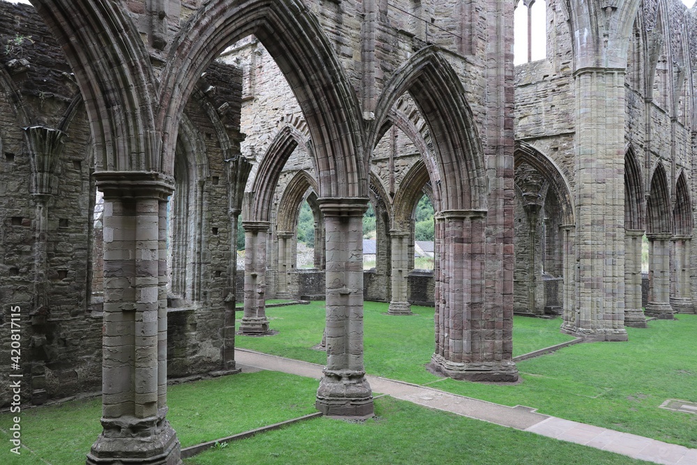 Tintern Abbey Interior Arches with Green Grass in Monmouthshire, Wales, UK
