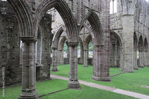 Tintern Abbey Interior Arches with Green Grass in Monmouthshire, Wales, UK