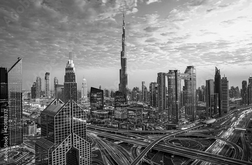 Obraz na płótnie View on modern skyscrapers and busy evening highways in luxury Dubai city,Dubai,United Arab Emirates w salonie
