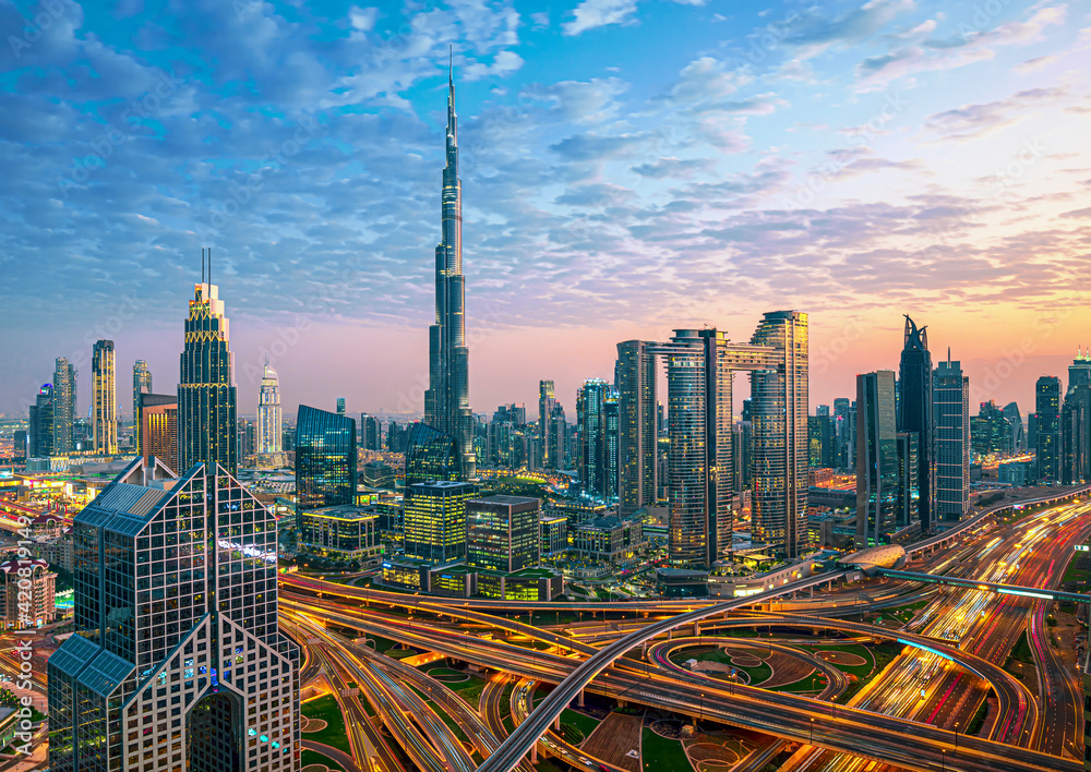 Dubai city center - amazing city skyline with luxury skyscrapers at sunrise, United Arab Emirates