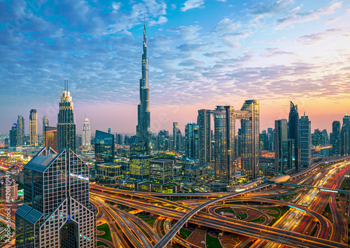 Obraz na płótnie Dubai city center - amazing city skyline with luxury skyscrapers at sunrise, United Arab Emirates w salonie