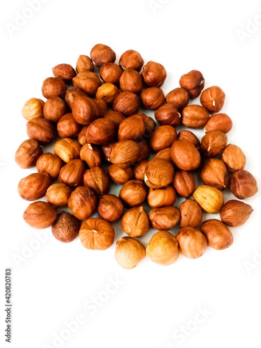 hazelnuts on white background